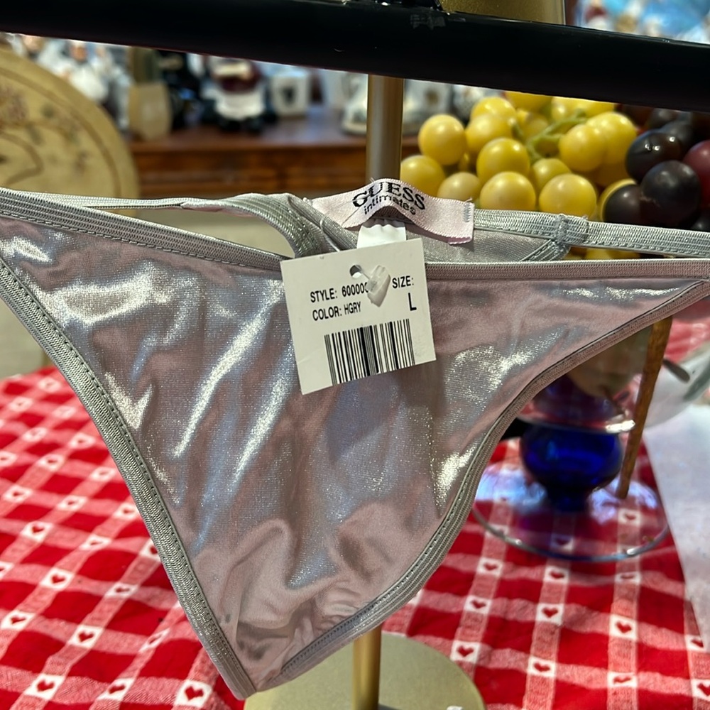 Size L NWT Guess Intimates satin thong. Soft and sexy